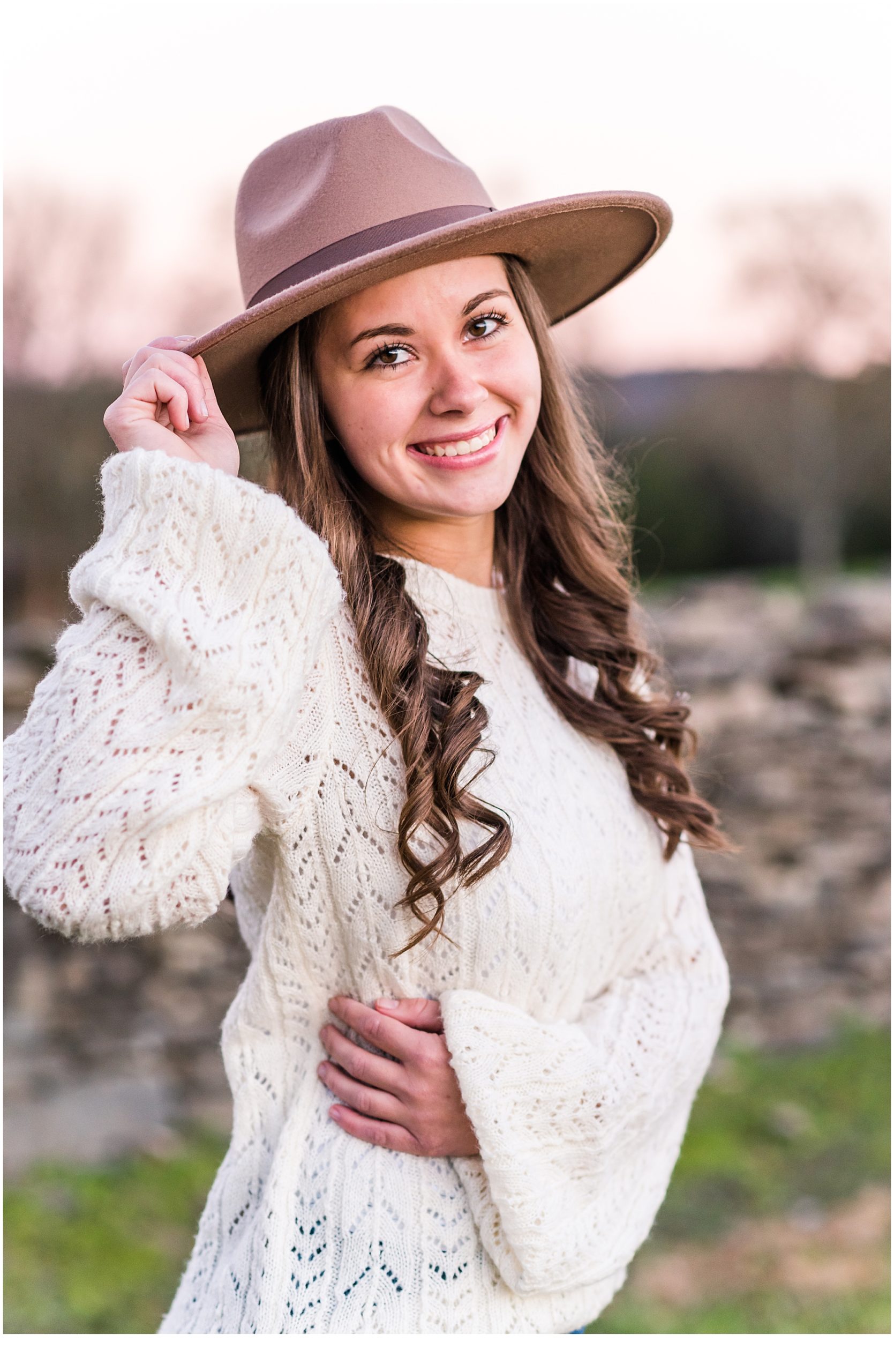 Close-up senior photo with natural sunlight and trees- Fall senior photos in Middle Tennessee