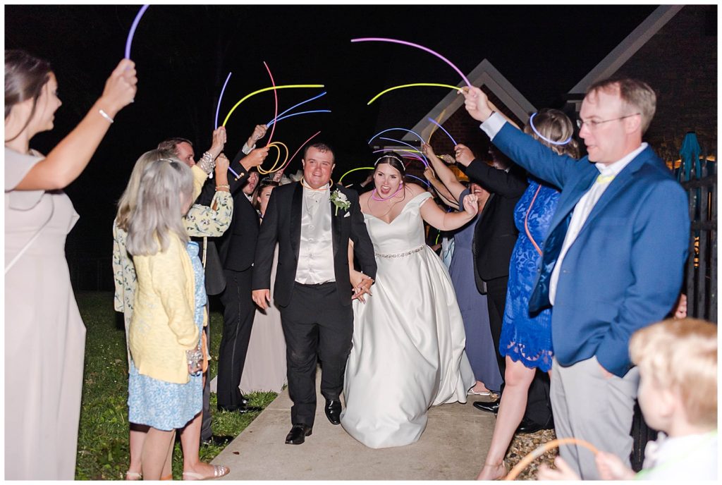 Bride and groom glow stick exit at wedding. King's Chapel, Arrington, TN