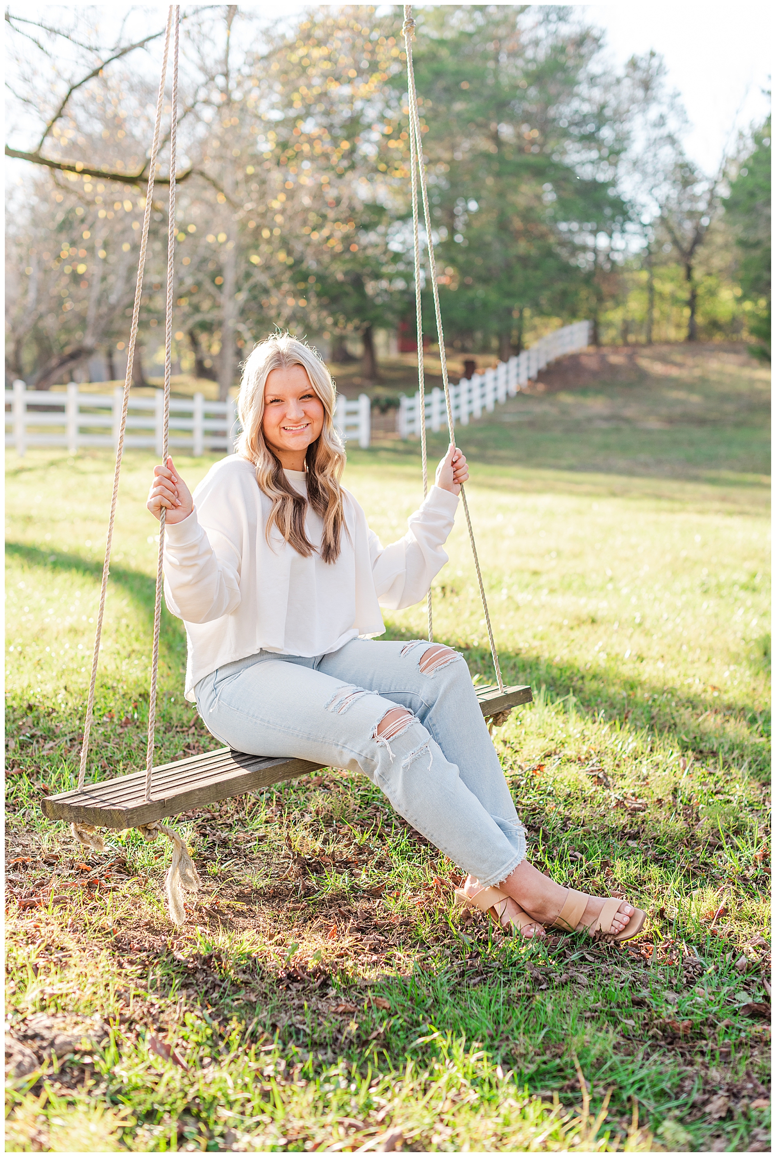 High school senior girl, sitting on a tree swing in Mt. Juliet, TN