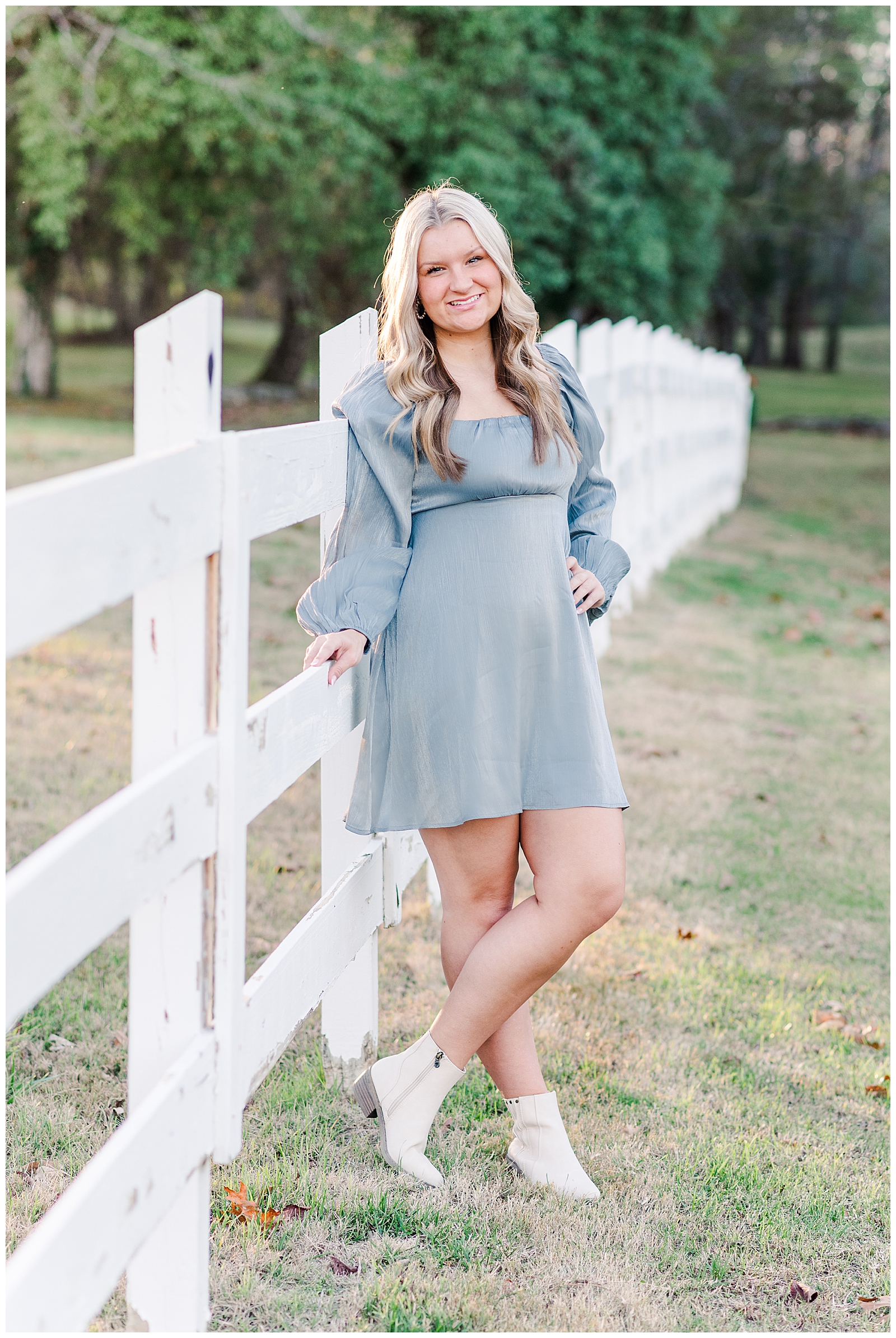 High school senior girl, leaning against a white fence in Mt. Juliet, TN